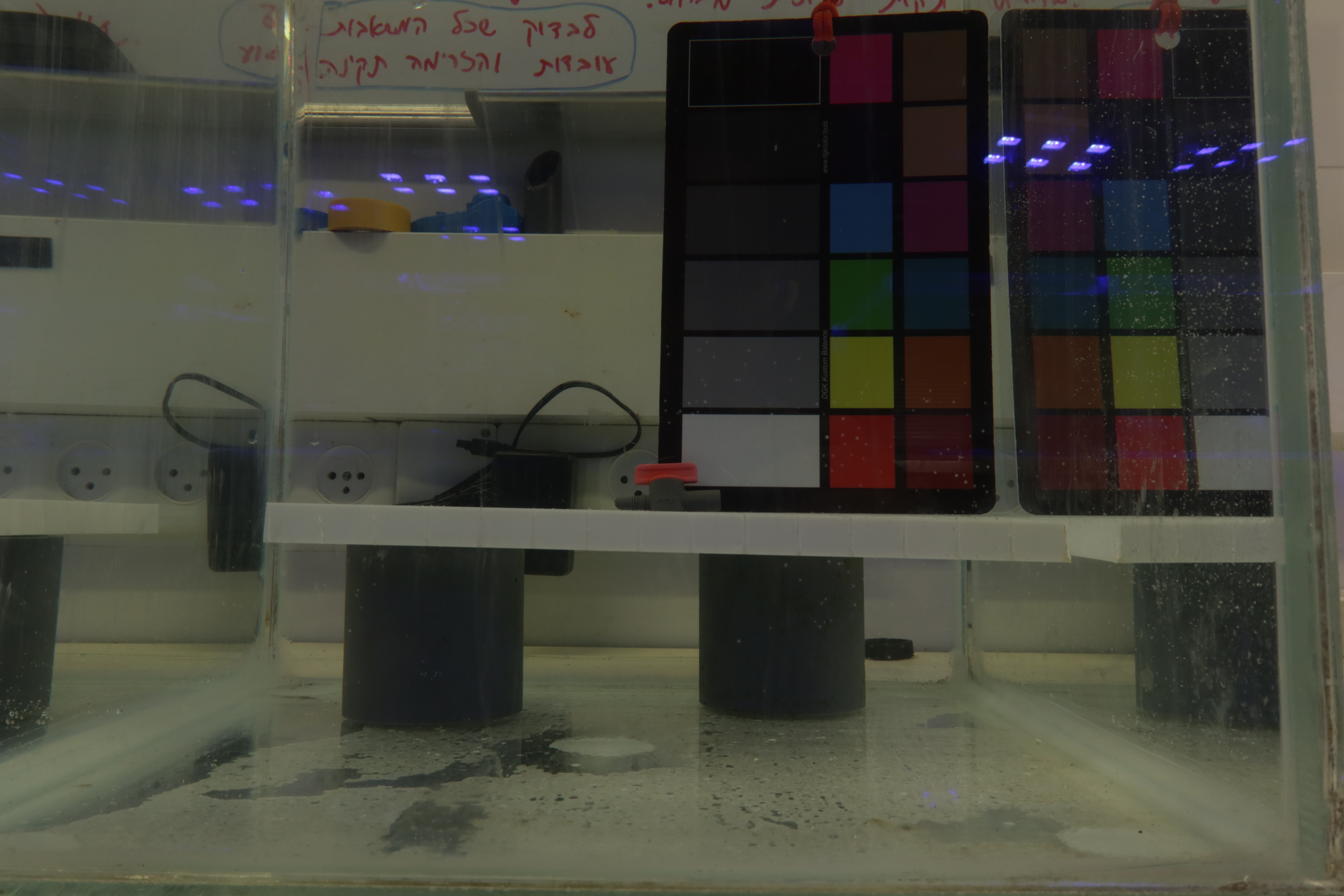 Figure 2: Image output from Imaging Rig V1 without backdrop, notice the reflected lights in the glass.